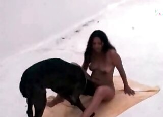 Curly brunette seduces a dog for pussy-licking session