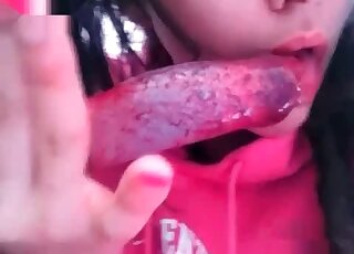 Closeup zoophilia video of a nasty slut deepthroating dog’s dick