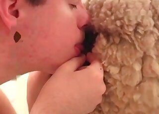 Nasty dude explores vagina of a sheep with his fingers and tongue