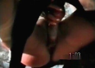 Brunette chick likes having her big black canine as her true lover