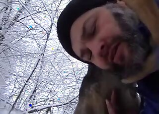 Bearded gay guy blows a dog in an outdoor porn movie right here