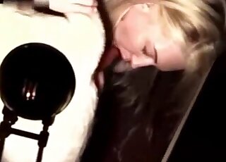 Blonde with perky breasts enjoying cowgirl riding with a white dog